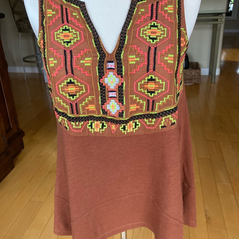 Akemi +Kin embroidered top with angular hemline.